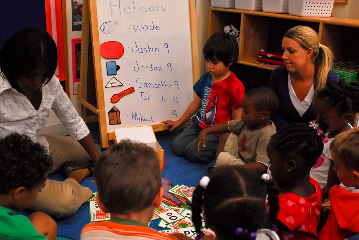 Children and teachers in a child development center classroom