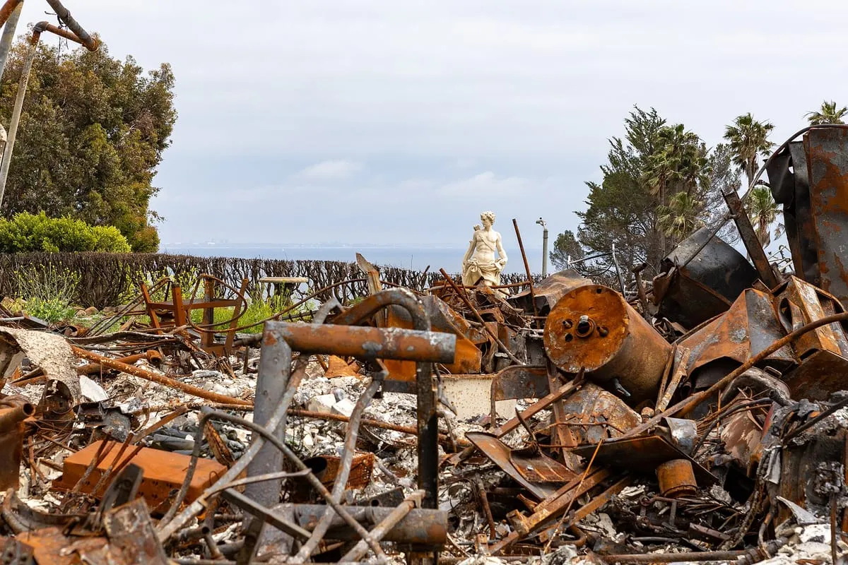 Wildfire-damaged homes in Malibu awaiting debris removal in May 2025, months after the Palisades Fire