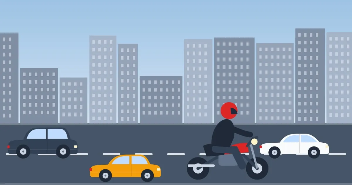 Illustration of a rider in a full-face helmet on a motorcycle in busy city traffic between tall buildings